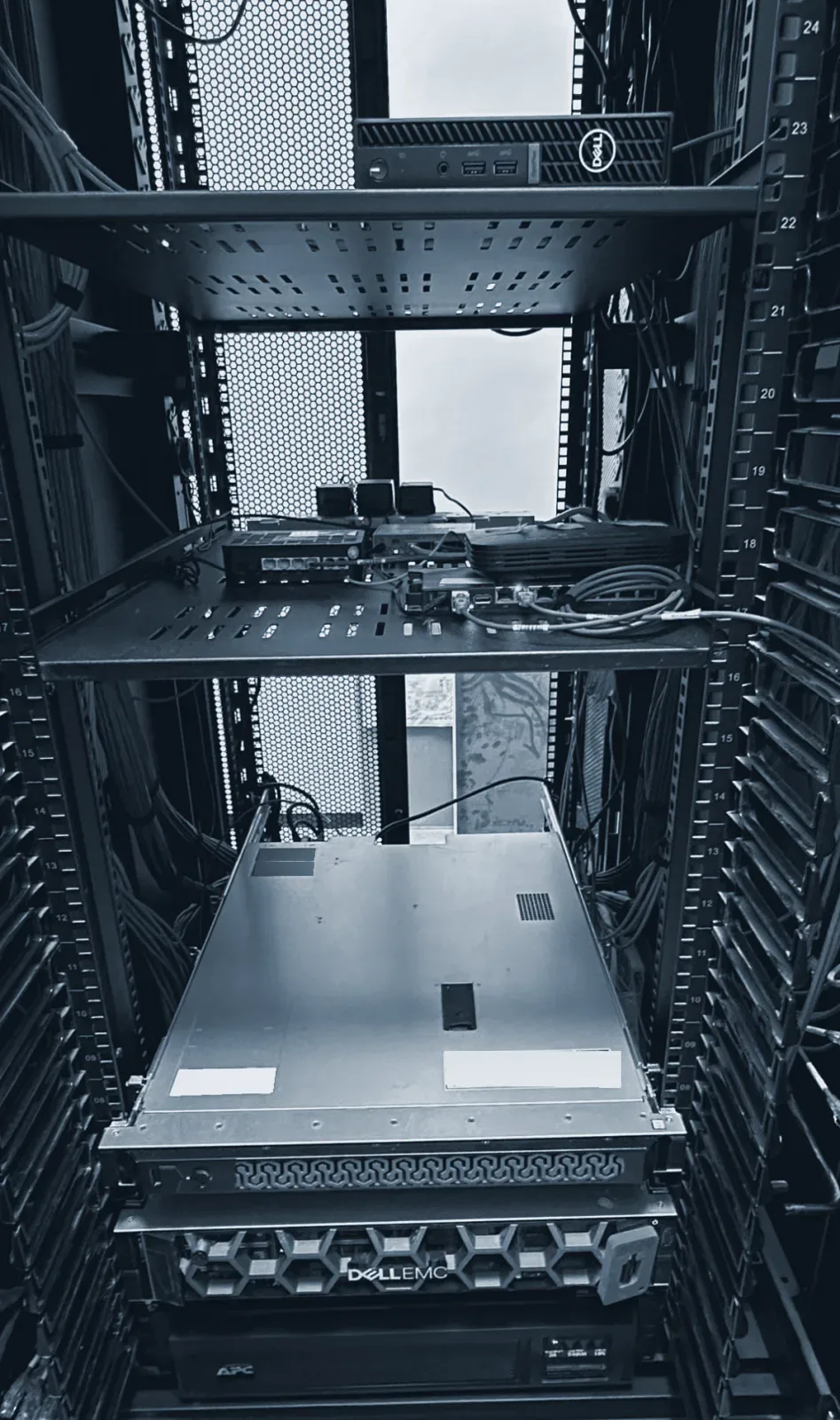 A backup appliance, servers and a UPS in a rack